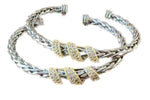 Load image into Gallery viewer, Stack of braided bracelets with gold and silver accents on a white background
