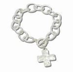 Load image into Gallery viewer, A silver chain bracelet with a hammered cross charm, displayed on a clean white background.
