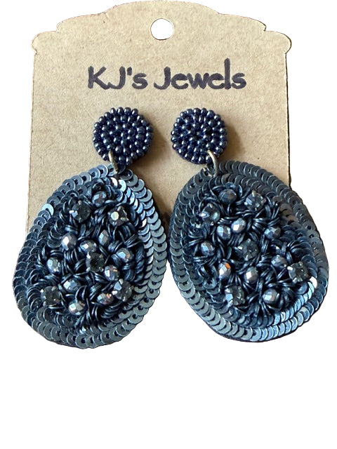 Pair of gray beaded earrings on a KJ's Jewels card 
