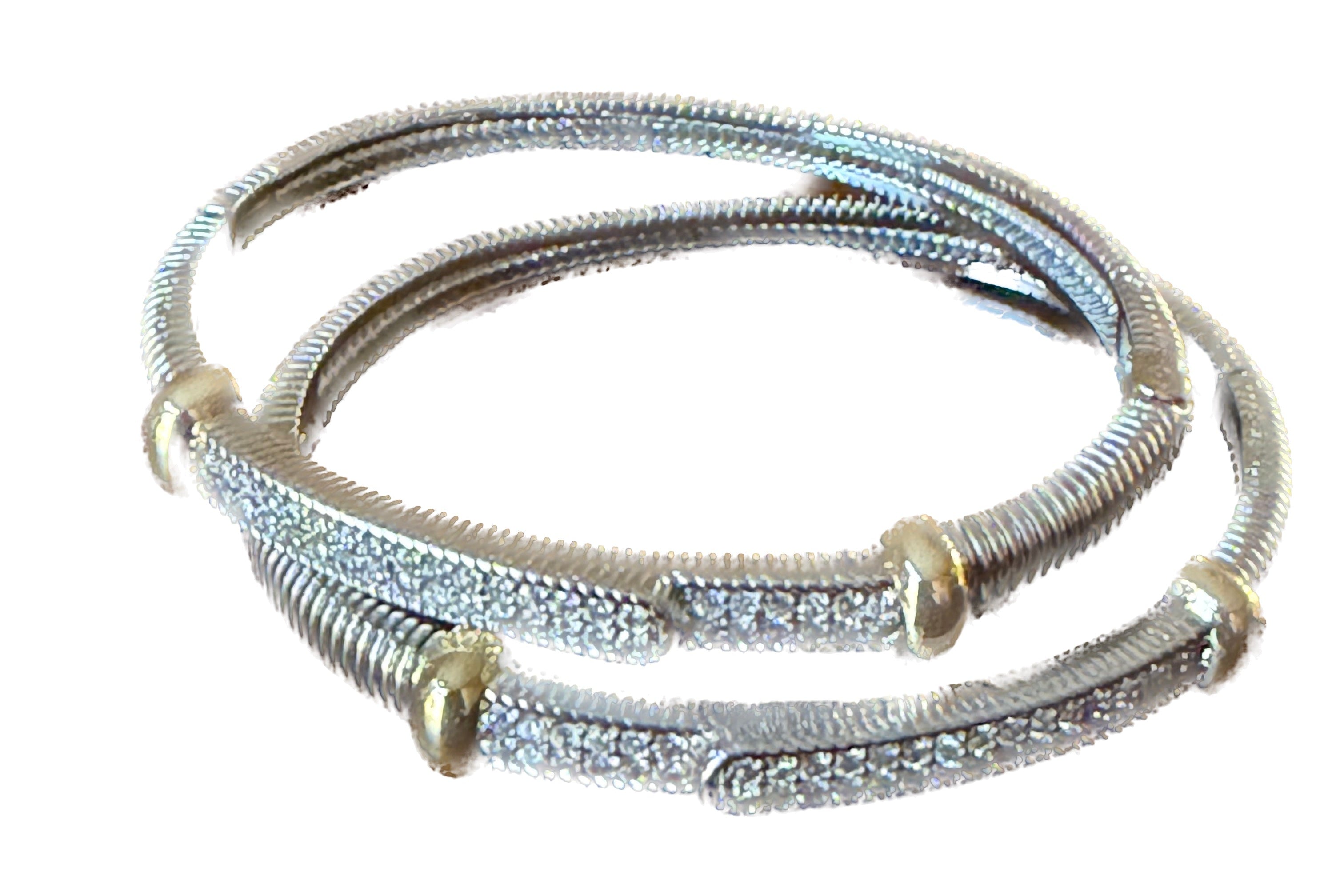 Set of silver and gold bangles on a white background
