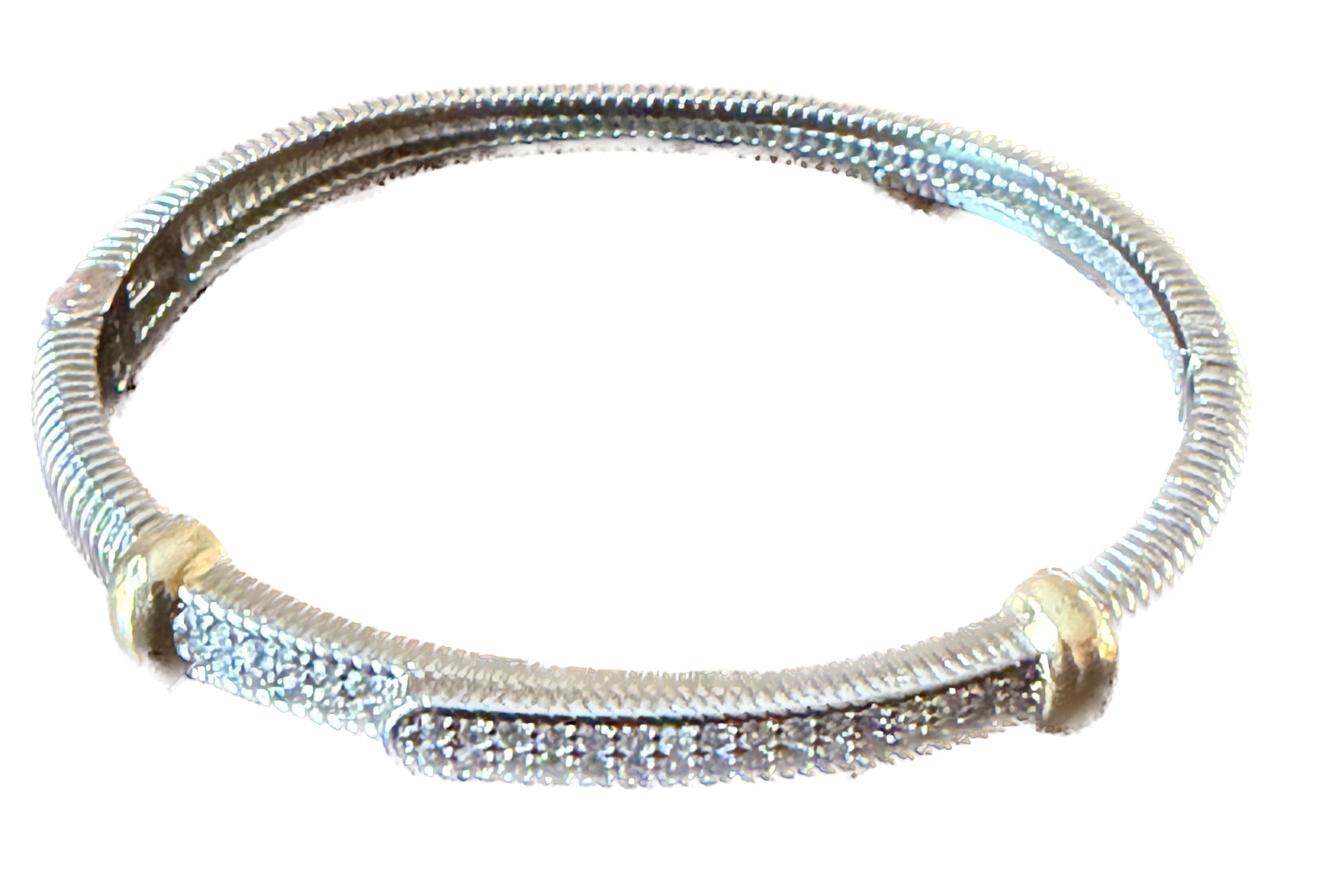 Silver bracelet with gold accents on a white background