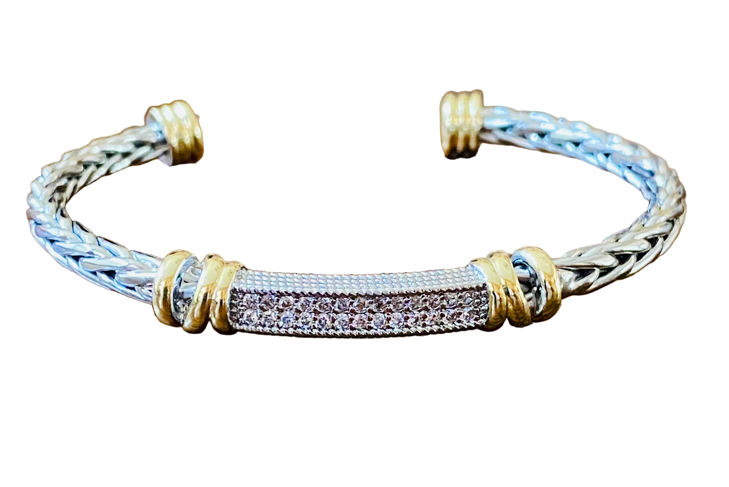 Two-Toned braided bracelet with gold accents on a white background